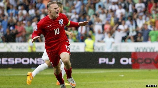 Wayne Rooney celebrates.