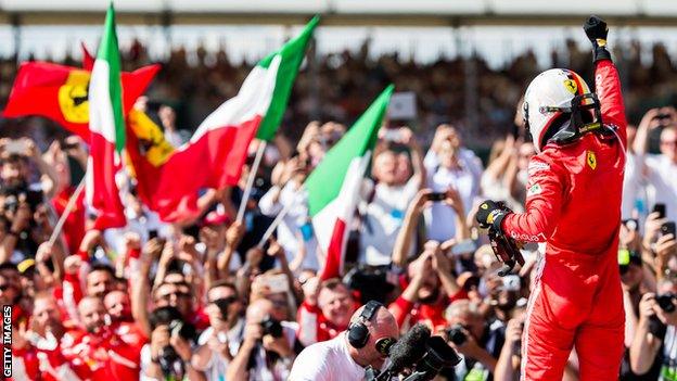 Vettel celebrates winning the British GP