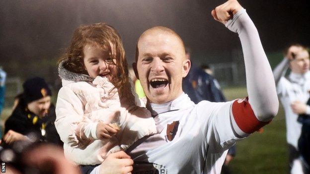 Barry Russell and his daughter celebrate beating Stenhousemuir