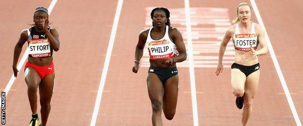 Amy Foster (right) in action in the 100m semi-finals at the Commonwealth Games