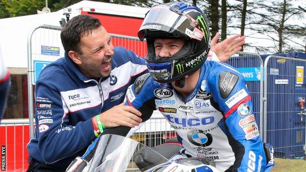 Ian Hutchinson is congratulated after winning the opening Superstock race at the Ulster Grand Prix