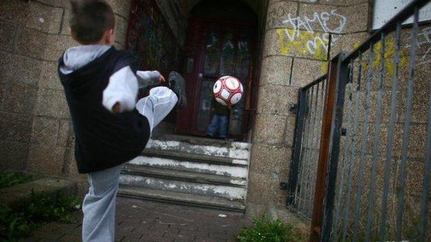 Child playing football