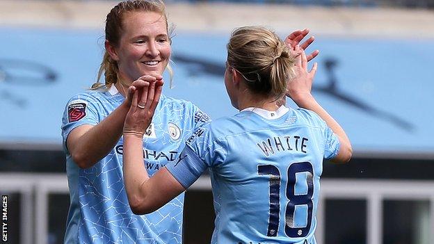 Man City's Sam Mewis celebrates her goal against West Ham with Ellen White