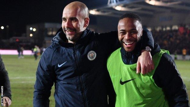 Pep Guardiola and Raheem Sterling