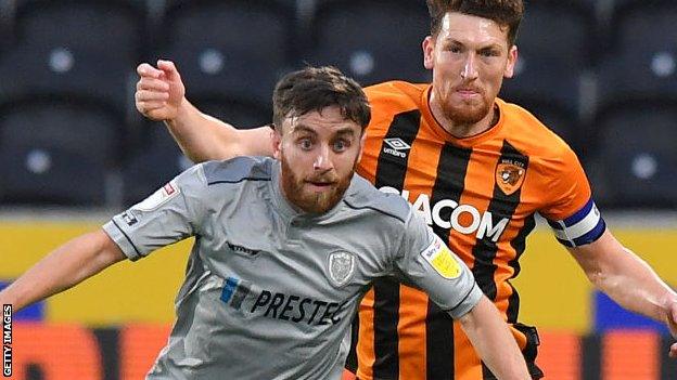 Steven Lawless (left) in action for Burton Albion against Hull City