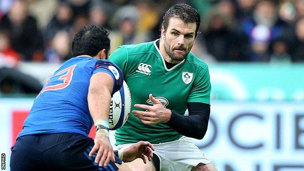 Ireland's Jared Payne attempts to evade France's in the Six Nations game on 13 February