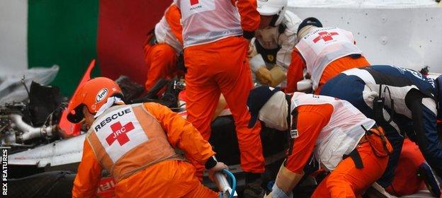 Jules Bianchi is attended to by paramedics following his crash at Suzuka in 2014