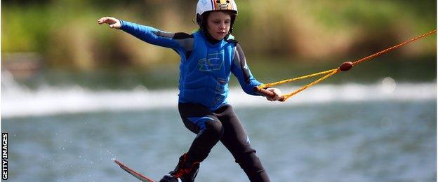 child wakeboarding