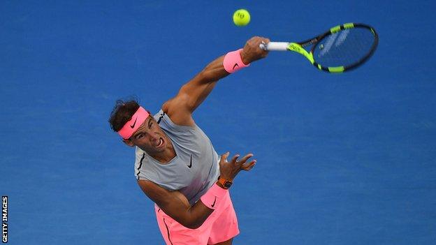 Rafael Nadal lines up to serve