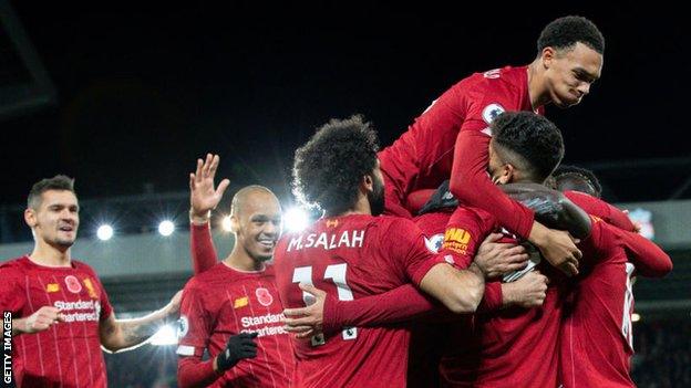 Liverpool players celebrate Sadio Mane's goal against Premier League rivals Manchester City in November