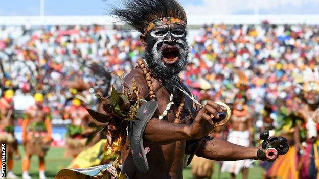 A tribal dance on the pitch before a PNG game