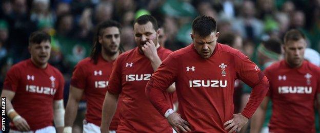 Wales players look upset at full time