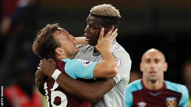 Mark Noble and Paul Pogba