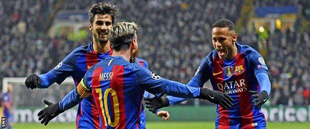 Lionel Messi celebrates with Neymar and Andre Gomes after giving Barcelona the lead