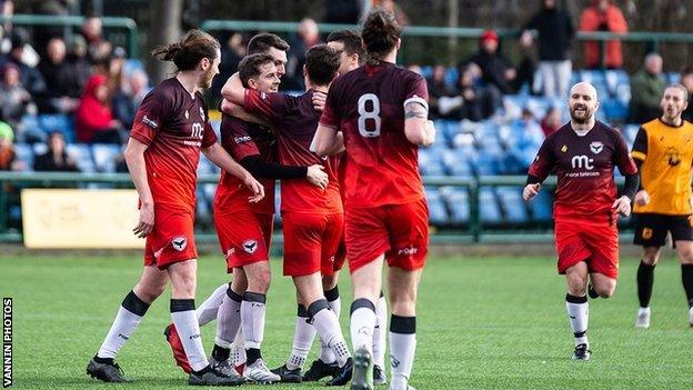 The Ravens celebrating after a goal