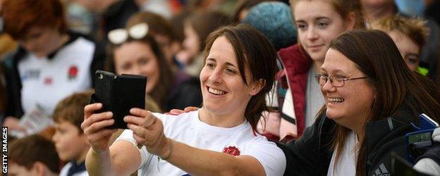 Katy Daley-Mclean takes a selfie with a fan in Exeter