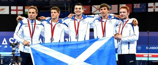 Team Scotland with medals after Glasgow 2014 Commonwealth Games