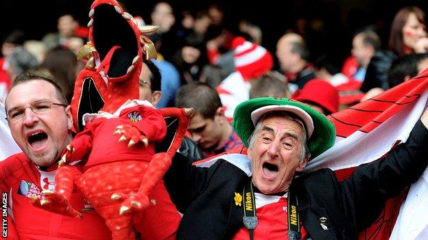 Fans celebrate a Wales rugby win at the Principality Stadium