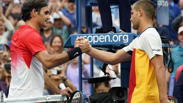 Roger Federer and Mikhail Youzhny