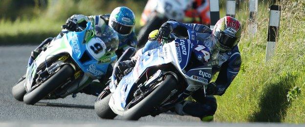 Dan Kneen heads Dean Harrison in the concluding Superbike race at Dundrod