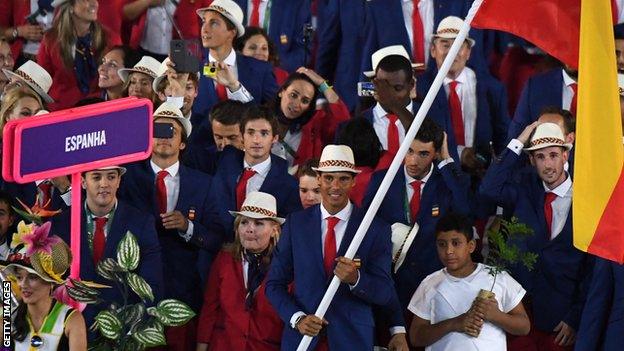 Rafael Nadal carries the Spanish flag at the opening ceremony of the Rio 2016 Olympic Games