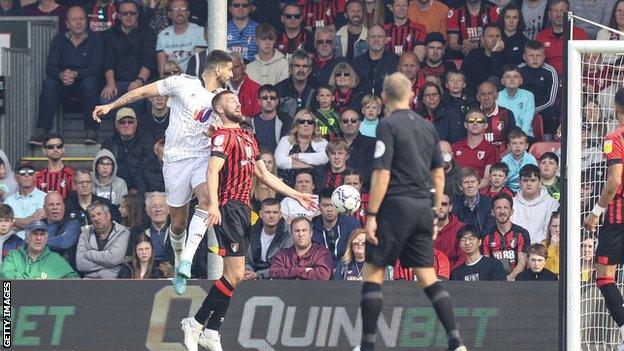 Aleksandar Mitrovic heads in for Fulham