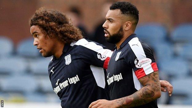 Kane Hemmings (right) celebrates scoring for Dundee against Dumbarton