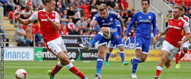 Joe Ralls lets fly at the Rotherham goal for Cardiff City