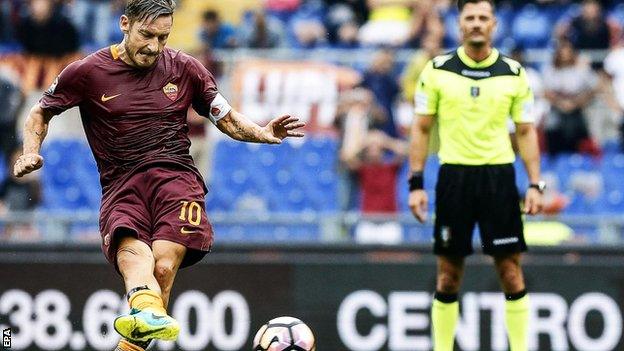 Francesco Totti scores a penalty for Roma