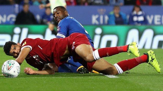 Liverpool's Dominic Solanke is challenged during their Carabao Cup defeat by Leicester