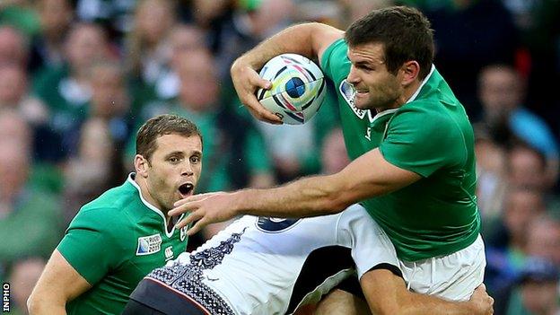 Darren Cave and Jared Payne in action for Ireland against Romania on Sunday