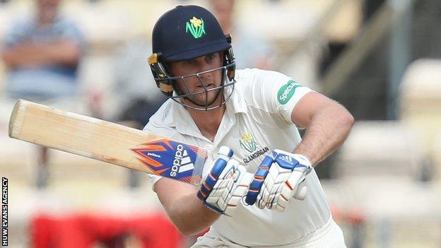 Chris Cooke plays a shot