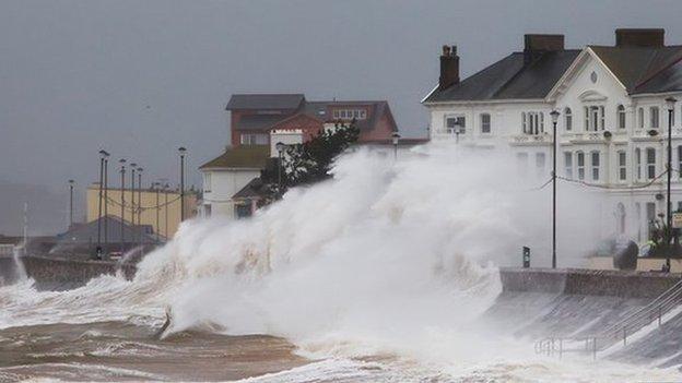 Waves crashing onto the promenade on Exmouth seafront