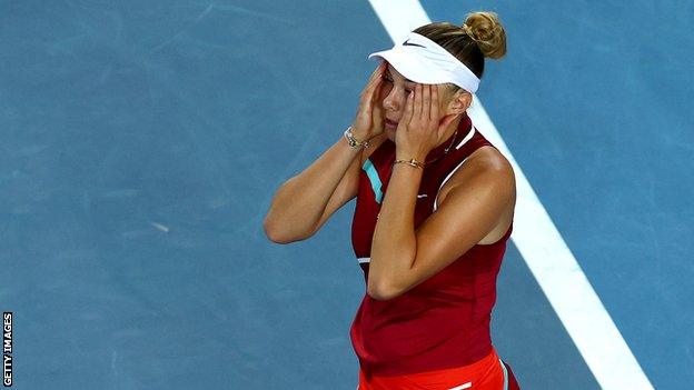 Amanda Anisimova celebrates victory over Naomi Osaka