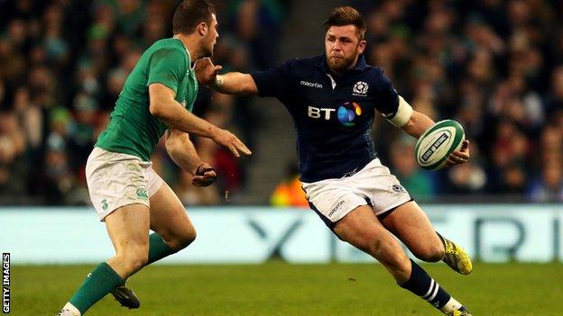 Ryan Wilson carries for the ball for Scotland against Ireland in last year's Six Nations