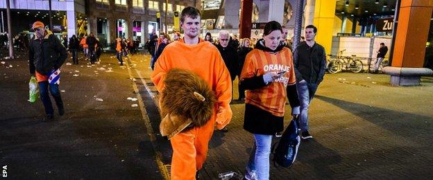 Dutch supporters after their team's defeat in Amsterdam