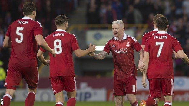 (from left) Ash Taylor, Wes Burns, Jonny Hayes and Kenny McLean