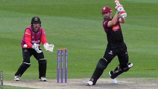 Somerset batsman James Hildreth (right) plays a shot