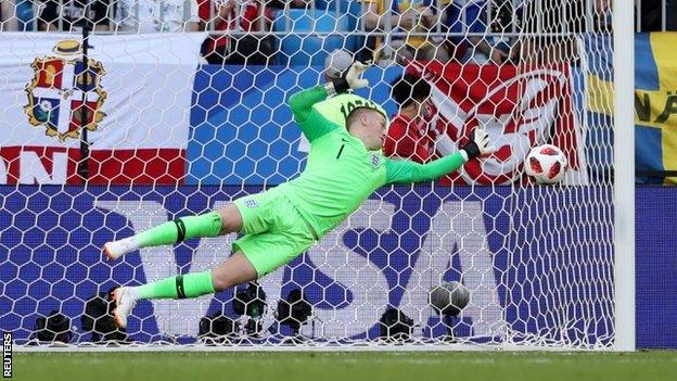 England keeper Jordan Pickford makes a save against Sweden in the World Cup quarter-final