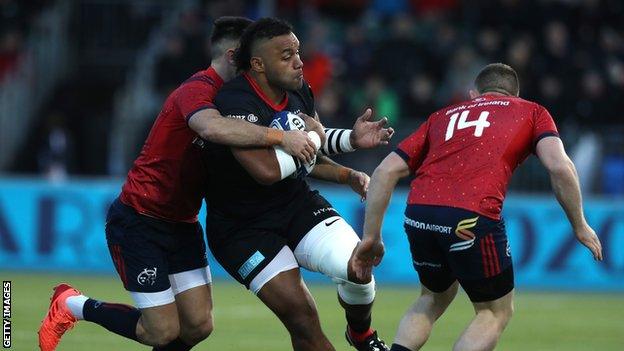 Billy Vunipola is tackled