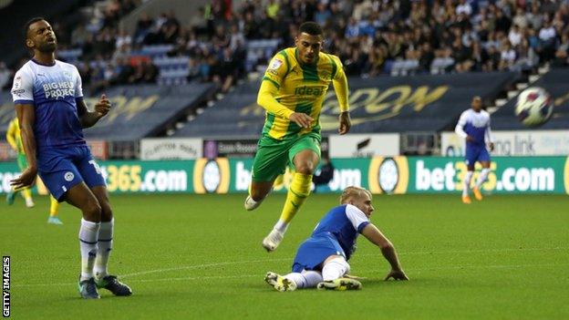 Karlan Grant of West Bromwich Albion scores against Wigan