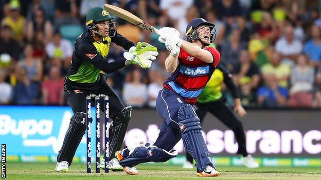 England captain Eoin Morgan skies a shot before he is caught during defeat by Australia