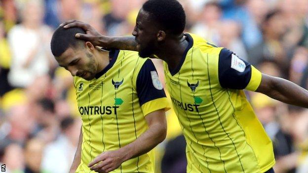 Liam Sercombe and Chey Dunkley of Oxford United