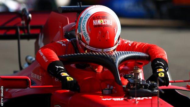 Charles Leclerc looking deflated after losing a first place finish