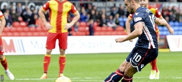 Ross County's Alex Schalk scores from the penalty spot