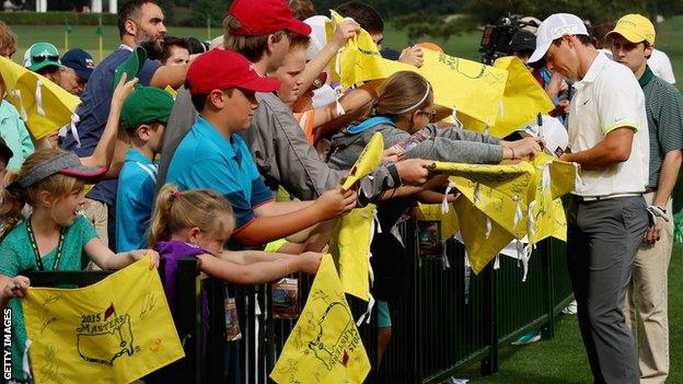 Rory McIlroy signs autographs at The Masters