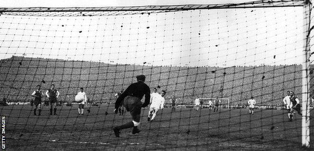 Ferenc Puskas scores from the spot at Hampden