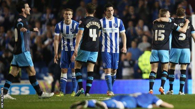 Brighton's players after their play-off semi-final defeat by Sheffield Wednesday