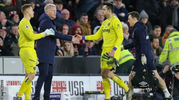 Lukasz Fabianski is replaced by David Martin after being injured against Sheffield United