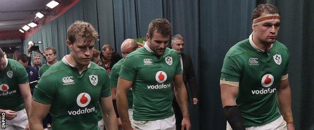 Andrew Trimble, Jared Payne and Rhys Ruddock trudge off the pitch after the defeat in Johannesburg